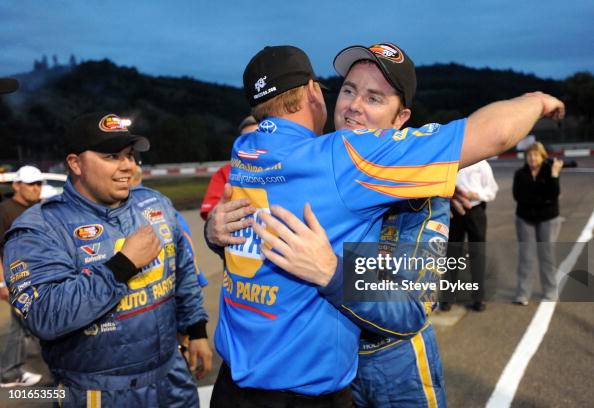 Eric Holmes Racing Eric Holmes is hugged by a member of his crew after winning the... News ...