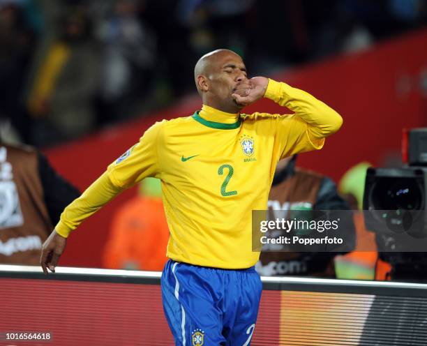 Maicon of Brazil celebrates after scoring Brazil's first goal during the 2010 FIFA World Cup Group G match between Brazil and North Korea at Ellis...