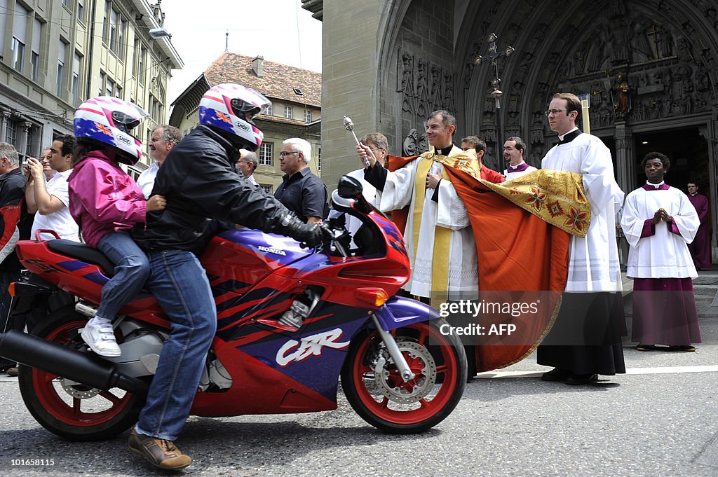 Bikers are blessed by the Cathedral of S