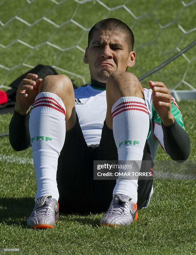 Mexico's defender Carlos Salcido stretch