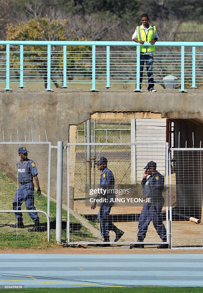 South African policemen patrol around th