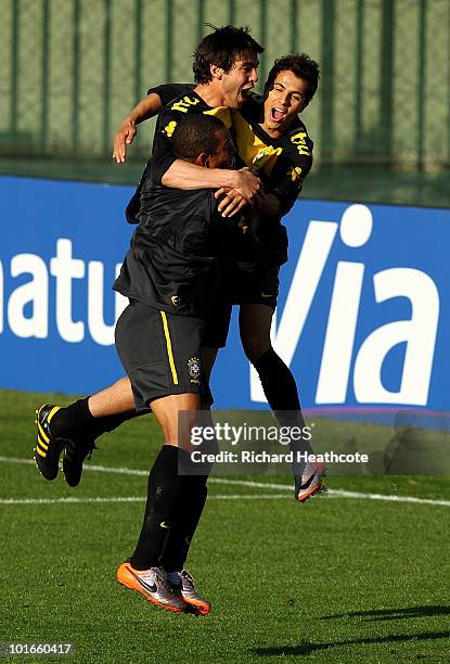 Kaka, Gilberto Silva and Nilmar jump in celebration during the Brazil training session at Randburg High School on June 6, 2010 in Johannesburg, South...