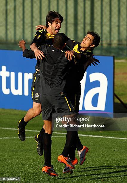 Kaka, Gilberto Silva and Nilmar jump in celebration during the Brazil training session at Randburg High School on June 6, 2010 in Johannesburg, South...