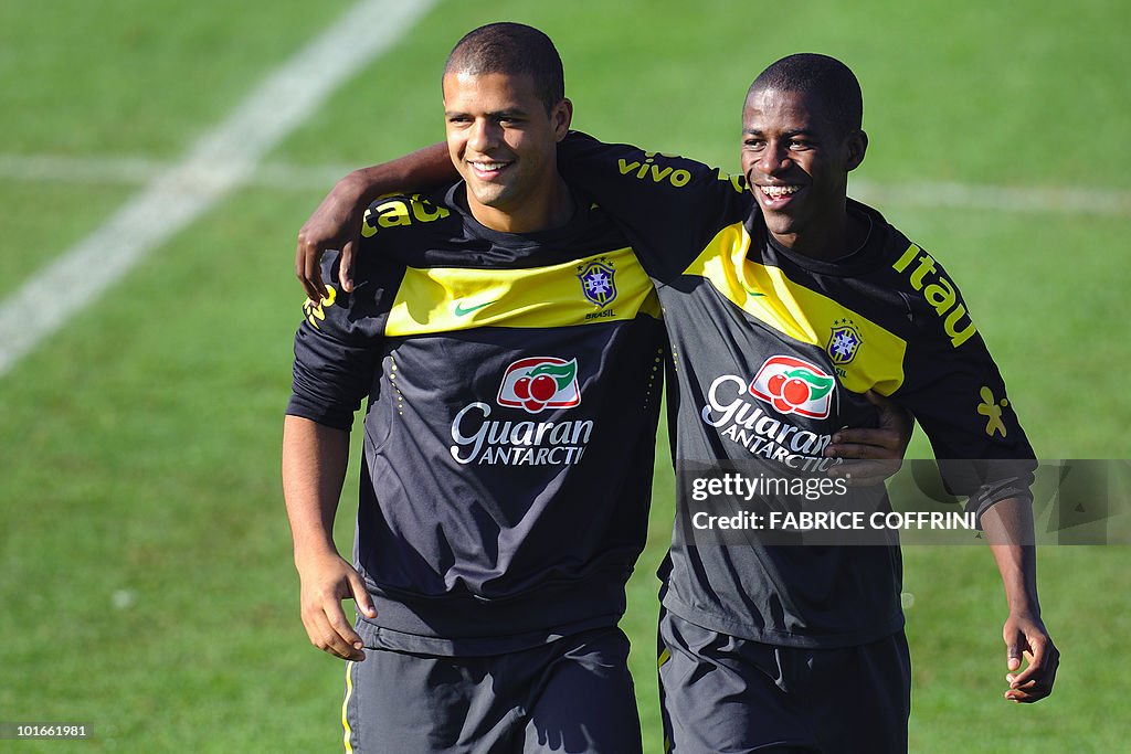 Brazil's Felipe Melo (L) stands with tea