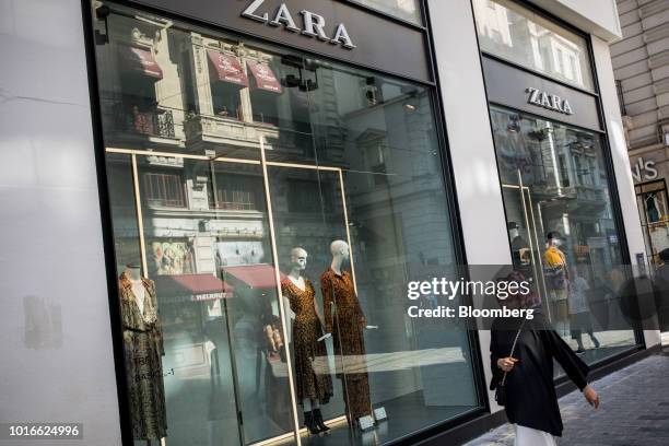 Pedestrian passes the window display of a Zara fashion store, operated by Inditex SA, on Istiklal street in Istanbul, Turkey, on Tuesday, Aug. 14,...