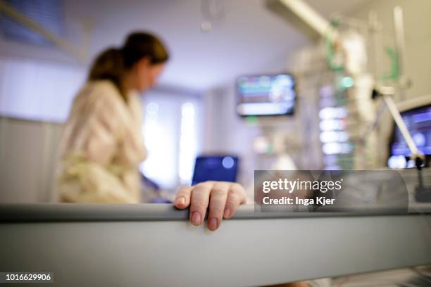 July 30: A female doctor looks after a patient in a intensive care unit on July 30, 2018 in Bad Belzig, Germany.