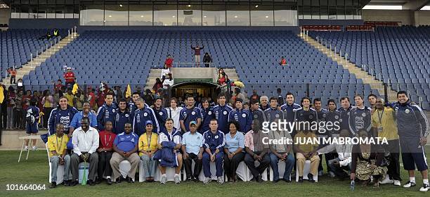Paraguay's squad poses for a group picture with local authorities in Pietermaritzburg at the end of a training session at Harry Gwala stadium on June...
