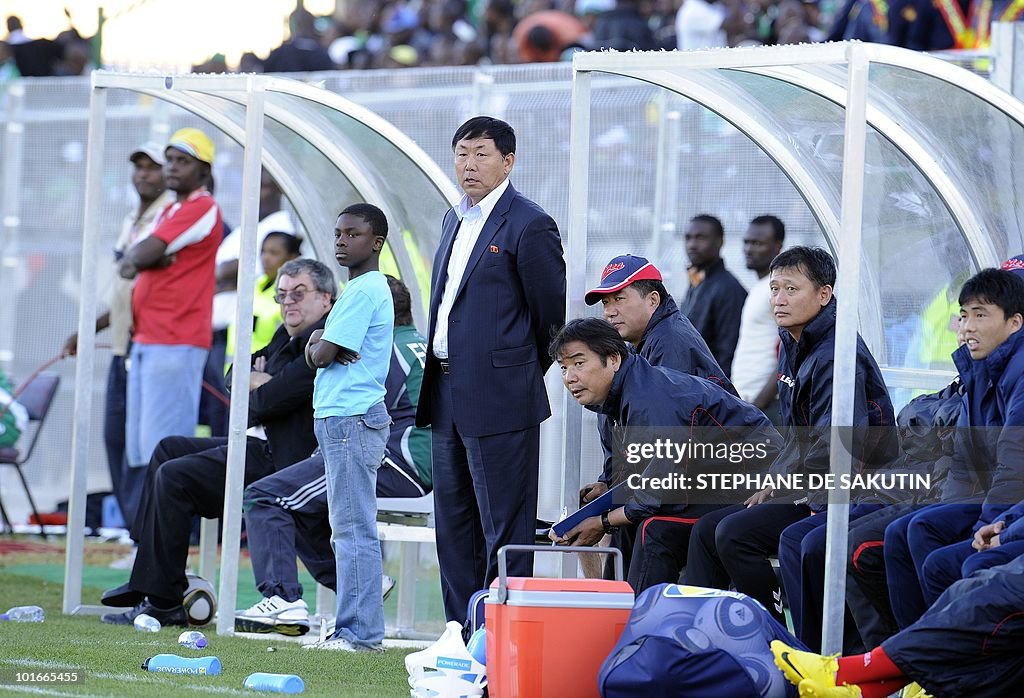 North Korea's coach, Kim Jong-Hun looks