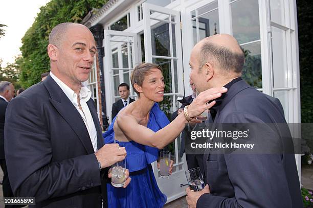 Jake Chapman, Tiphaine de Lussey and Marc Quinn attend the annual Raisa Gorbachev Foundation Party at Stud House, Hampton Court on June 5, 2010 in...