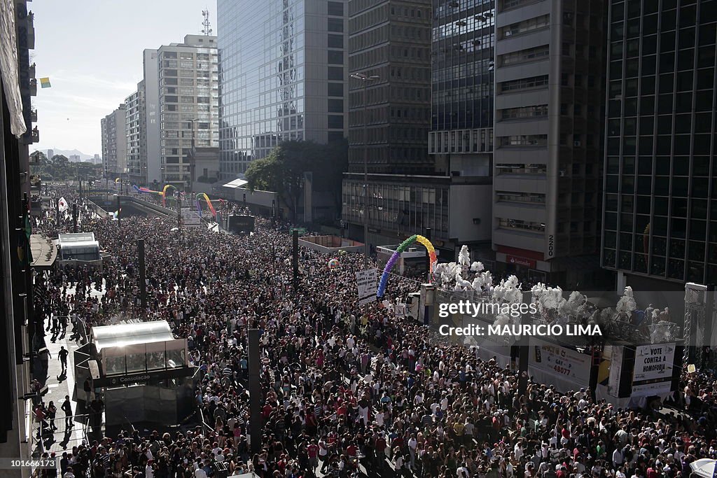 Thousands of people sing and dance durin