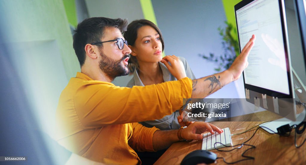 Software developers doing some research.