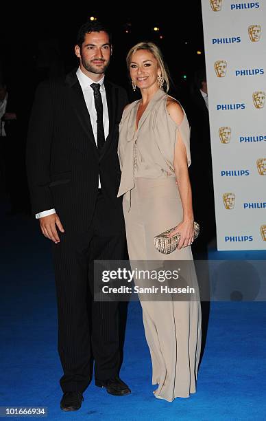 Actors Tamzin Outhwaite and her husband Tom Ellis arrives for the Philips British Academy Television Awards Afterparty at the Natural History Museum...