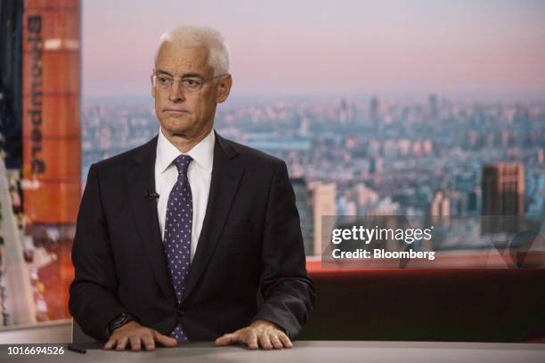 Jim Rossman, head of shareholder advisory and managing director at Lazard Freres & Co., listens during a Bloomberg Television interview in New York,...