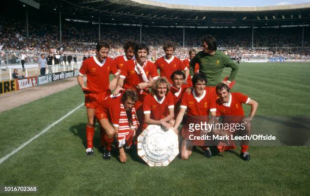 August 1979 Wembley - Football Association Charity Shield - Arsenal v Liverpool - The victorious Liverpool players pose with the trophy as Kenny...