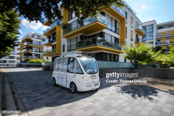 An electric autonomous bus drives on August 14, 2018 in Mainz, Germany. Called EMMA, the bus is made by Navya and will transport passengers for free...