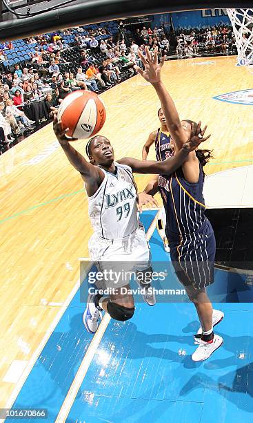 Hamchetou Maiga-Ba of the Minnesota Lynx goes to the hoop against Tammy Sutton-Brown of the Indiana Fever during the game on June 6, 2010 at the...