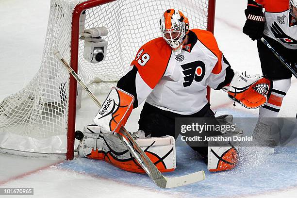 Michael Leighton of the Philadelphia Flyers lets in a goal by Kris Versteeg of the Chicago Blackhawks in the first period in Game Five of the 2010...