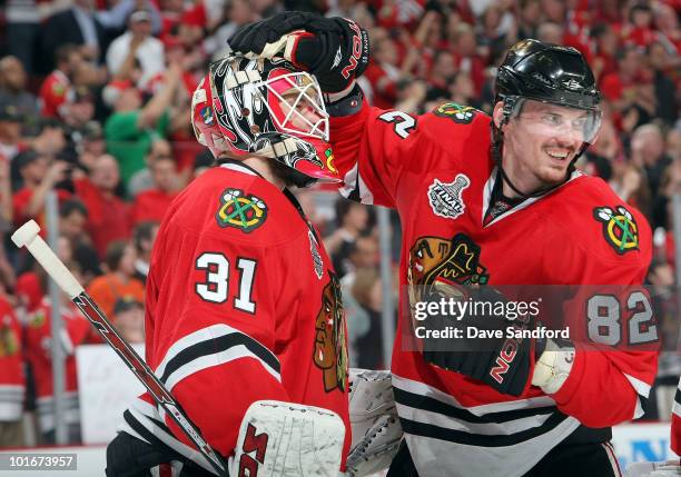 Tomas Kopecky of the Chicago Blackhawks celebrates their 7-4 win with goaltender Antti Niemi after Game Five of the 2010 NHL Stanley Cup Finals...