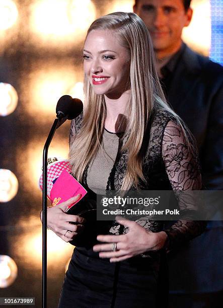 Amanda Seyfried accepts the Scared-As-Shit Performance award onstage at the 2010 MTV Movie Awards held at the Gibson Amphitheatre at Universal...