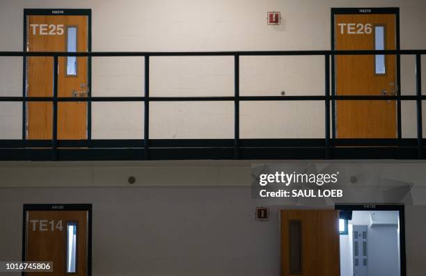 Cell room doors are seen at the Caroline Detention Facility in Bowling Green, Virginia, on August 13, 2018. - A former regional jail, the facility...