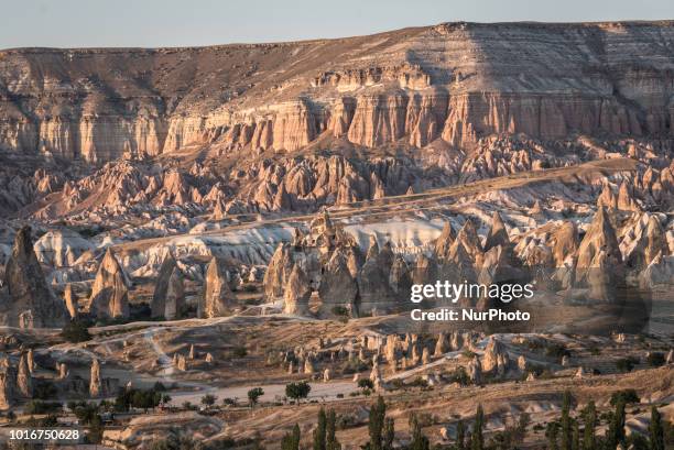 Fairy chimneys, desert landscapes and historic caves that are iconic tourist attractions near the town of Goreme in the Cappadocia region of central...