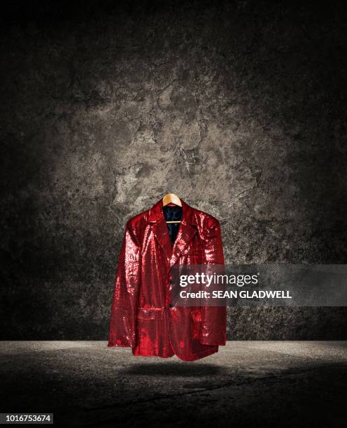 floating red sequin cabaret jacket on hanger - red coat stock pictures, royalty-free photos & images