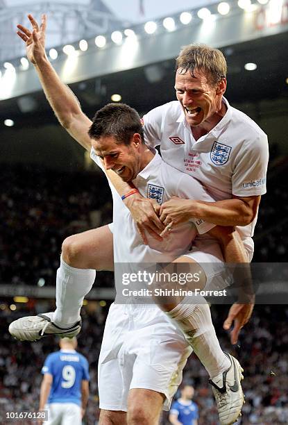 Jamie Redknappp and Teddy Sheringham participate in Soccer Aid in aid of UNICEF at Old Trafford on June 6, 2010 in Manchester, England.