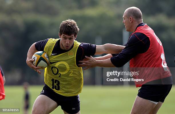Dominic Waldouck of England moves past Mike Tindall during the England rugby training session held at McGillveray Oval on June 7, 2010 in Perth,...
