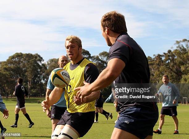 Chris Robshaw passes the ball to team mate Paul Doran-Jones during the England rugby training session held at McGillveray Oval on June 7, 2010 in...