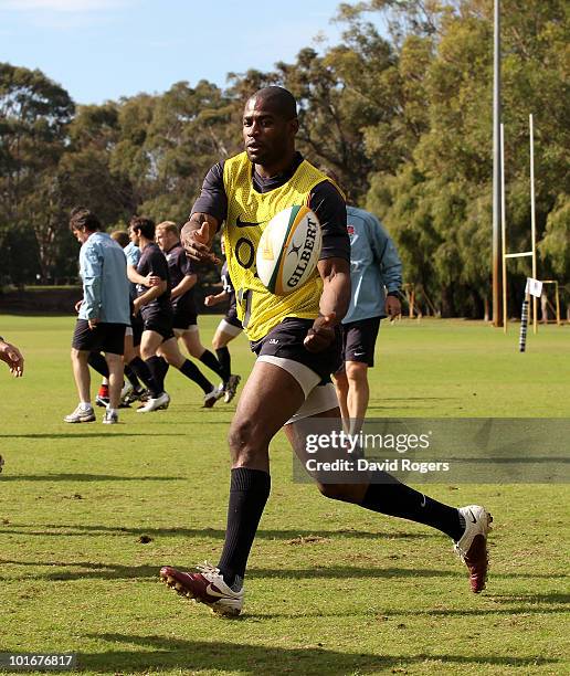 Ugo Monye passes the ball during the England rugby training session held at McGillveray Oval on June 7, 2010 in Perth, Australia.