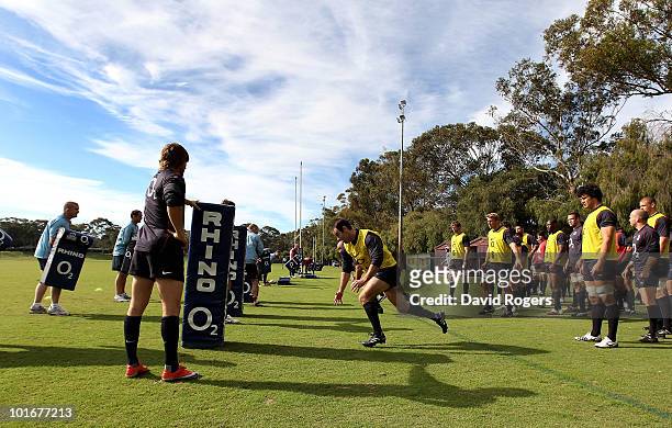 Charlie Hogson charges towards the tackle bags during the England rugby training session held at McGillveray Oval on June 7, 2010 in Perth, Australia.
