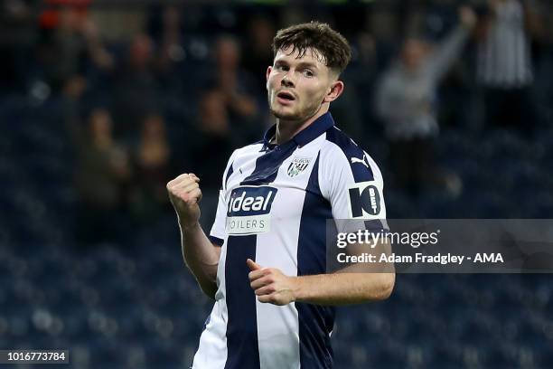 Oliver Burke of West Bromwich Albion celebrates after scoring a goal to make it 1-0 during the Carabao Cup First Round match between West Bromwich...