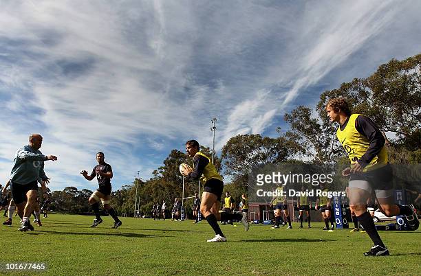 Olly Barkley runs with the ball during the England rugby training session held at McGillveray Oval on June 7, 2010 in Perth, Australia.