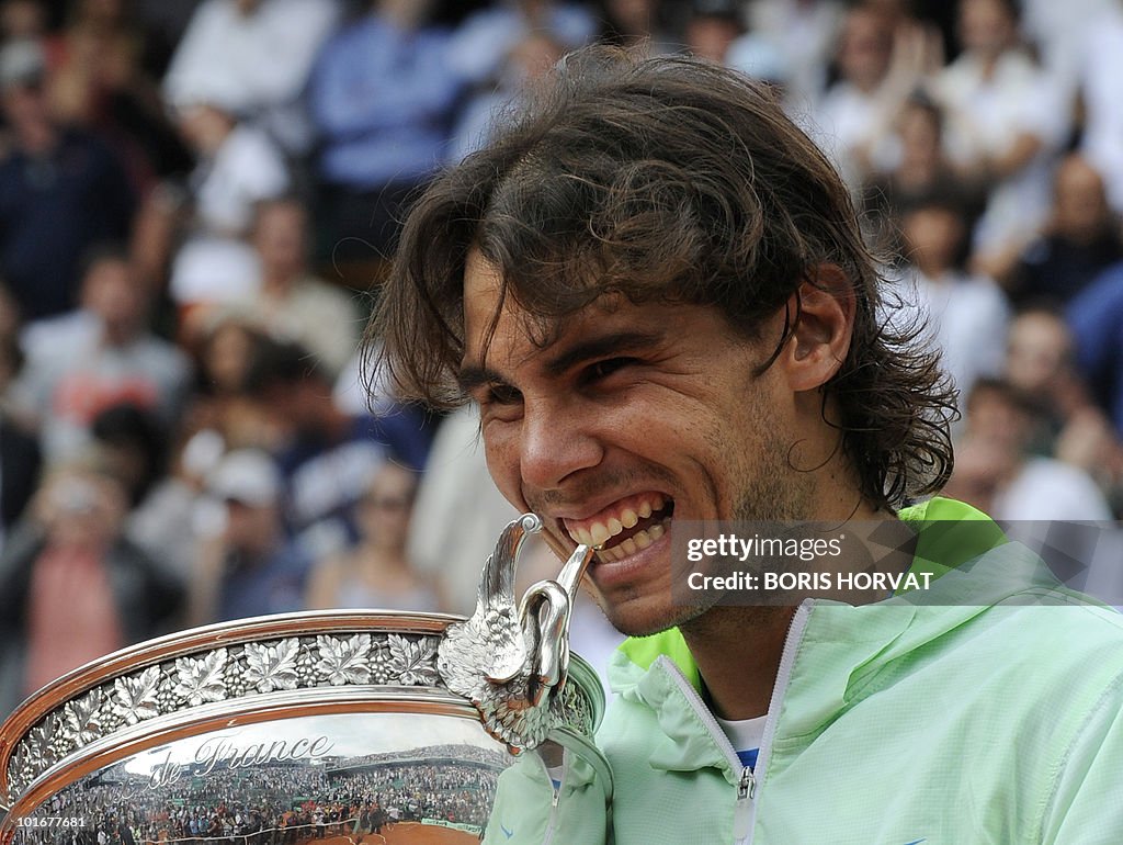 Spain's Rafael Nadal poses with the winn