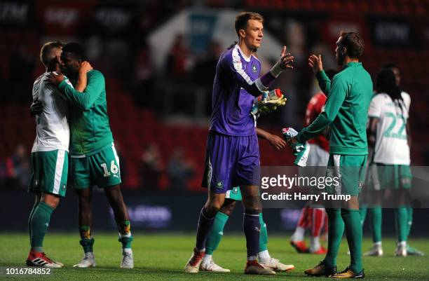 Members of the Plymouth Argyle side celebrate at the final whistle during the Carabao Cup First Round match between Bristol City and Plymouth Argyle...