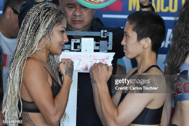 Mariana Juarez 'Barby' and Terumi Nuki face off during a weigh-in on August 10, 2018 in Mexico City, Mexico. Mariana 'Barby' Juarez of Mexico will...