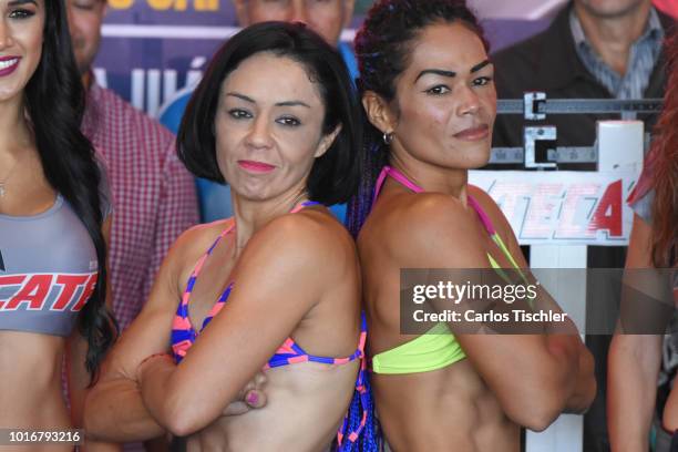 Jackie Nava and Alys Sanchez pose for photos during a weigh-in on August 10, 2018 in Mexico City, Mexico. Mariana 'Barby' Juarez of Mexico will fight...