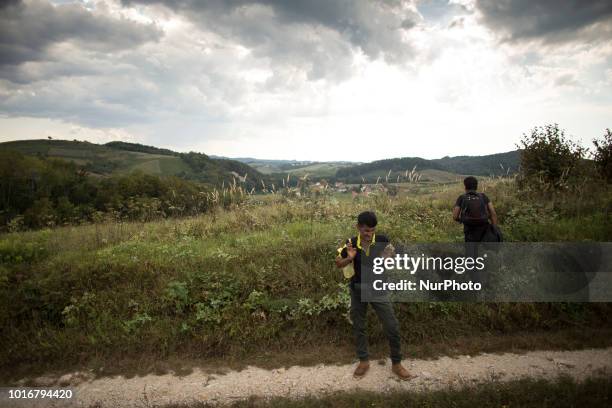 Refugee rests before crossing the border near Velika Kladusa, Bosnia and Herzegovina on August 13, 2018.