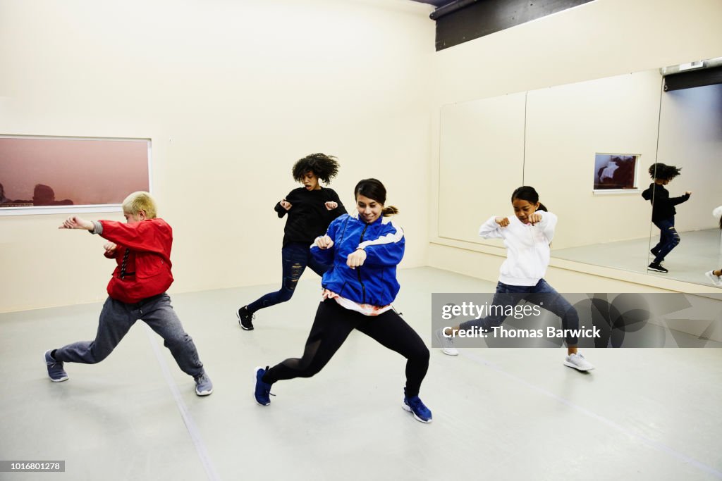 Female hip hop dance group practicing in dance studio