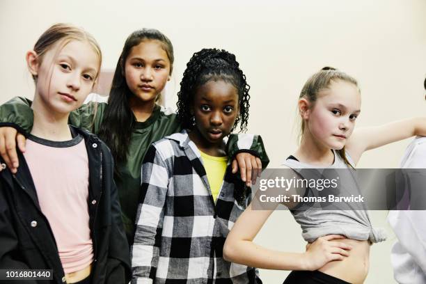 portrait of girls in hip hop dance group standing in studio after practice - 12 13 girl stock-fotos und bilder