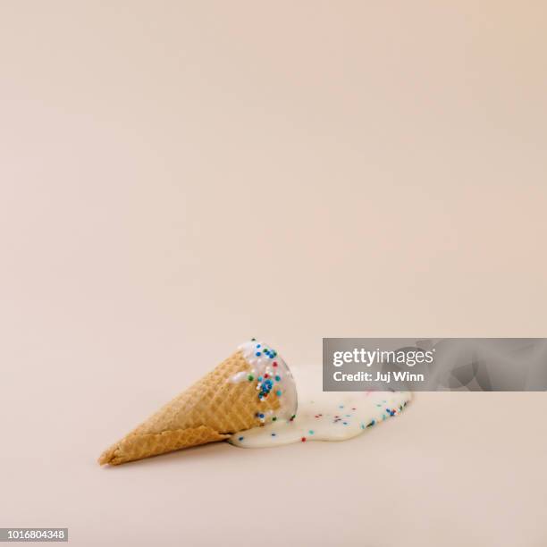 melted ice cream cone - ice-cream-spill stock pictures, royalty-free photos & images