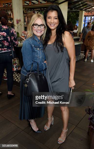 Actors Maureen McCormick and Kelly Hu attend the "Born This Way" Season 4 Brunch Event at Catch on August 14, 2018 in West Hollywood, California.