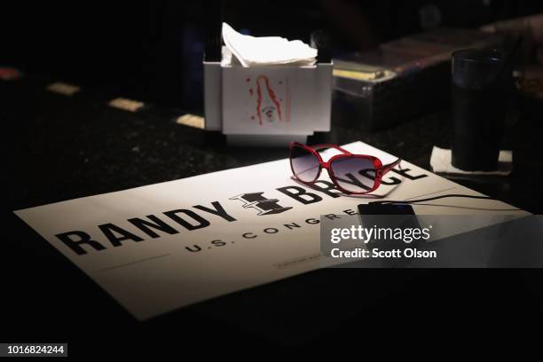 Supporters of Democratic congressional candidate Randy Bryce wait for returns to come in at an election-night rally on August 14, 2018 in Racine,...