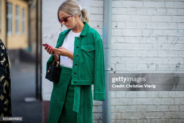 Guest is seen outside Iben during Oslo Runway SS19 on August 14, 2018 in Oslo, Norway.