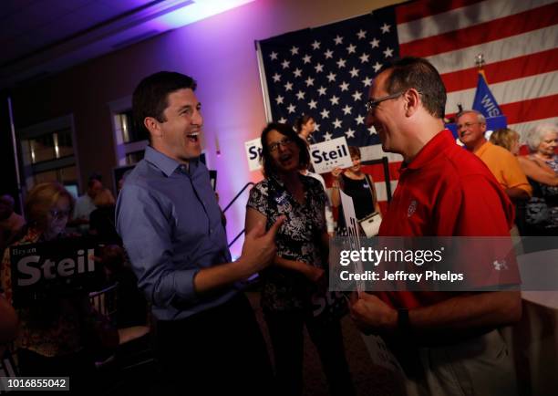 Republican candidate Bryan Steil for U.S. Congress celebrates with supporters after winning in the Primary election on August 14, 2018 in Burlington,...