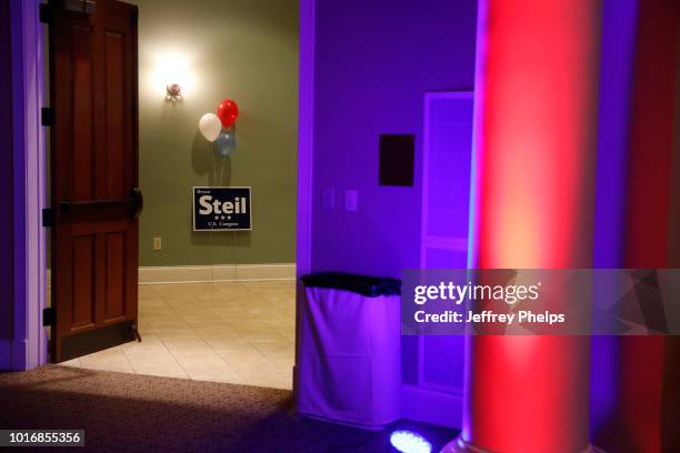 Sign for Republican candidate Bryan Steil U.S. Congress stands in a hallway at his victory party in the Primary election on August 14, 2018 in...