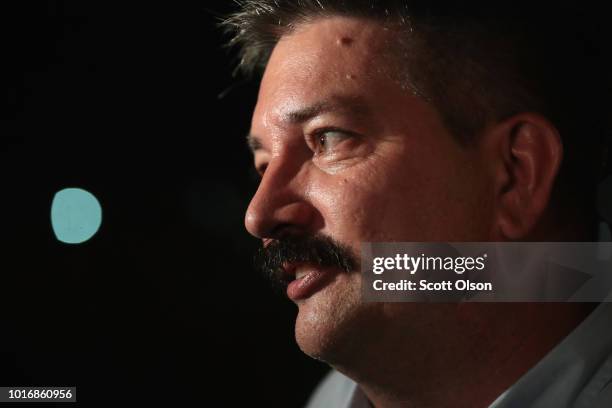 Democratic congressional candidate Randy Bryce speaks to reporters at an election-night rally after being declared the winner in the Wisconsin...