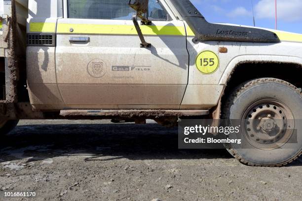 Signage for Gold Fields Ltd. Is displayed on the door of a vehicle at the Granny Smith gold mine outside of Laverton, Western Australia, Australia,...