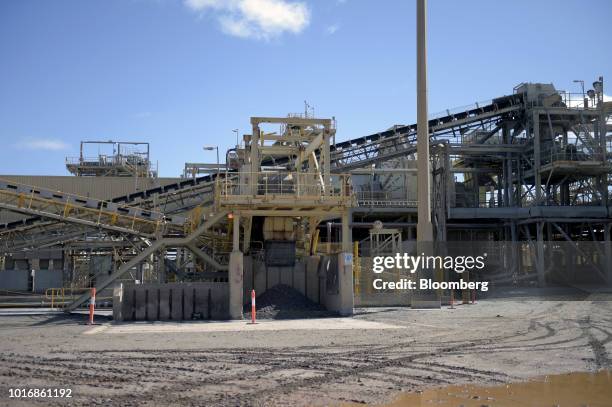 Ore moves along a conveyor at the processing plant of the Granny Smith gold mine , operated by Gold Fields Ltd., outside of Laverton, Western...
