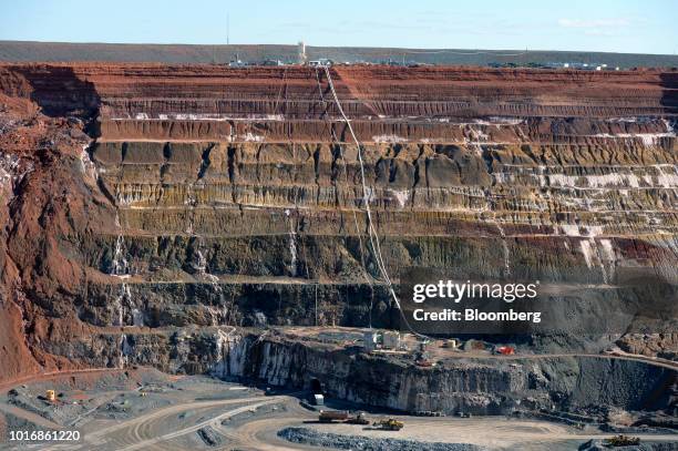 Heavy equipment operates in an open pit mine at the Granny Smith gold mine , operated by Gold Fields Ltd., outside of Laverton, Western Australia,...